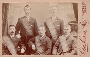 Group portrait showing five men in Edwardian costume